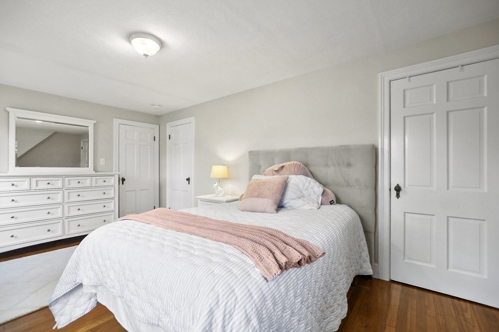348 Webster Street Needham, MA 02494 - Photo 28 of 42 a bedroom with a bed and a dresser