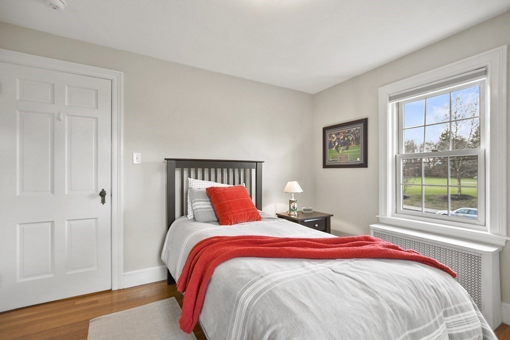 348 Webster Street Needham, MA 02494 - Photo 30 of 42 a bedroom with bed and a window