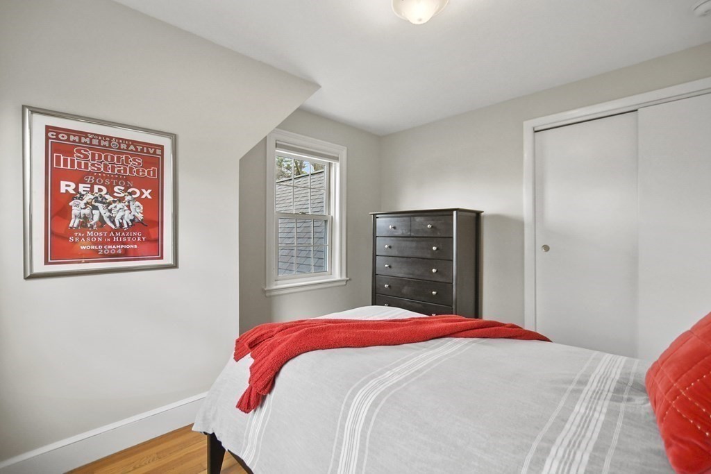 348 Webster Street Needham, MA 02494 - Photo 31 of 42 a bedroom with a bed and a window