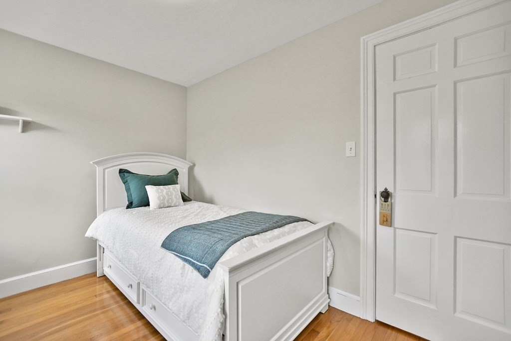 348 Webster Street Needham, MA 02494 - Photo 33 of 42 a bedroom with a bed and a window