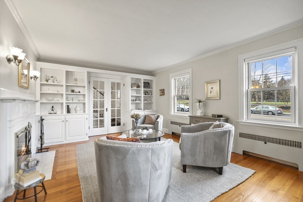 348 Webster Street Needham, MA 02494 - Photo 4 of 42 a living room with furniture and a large window