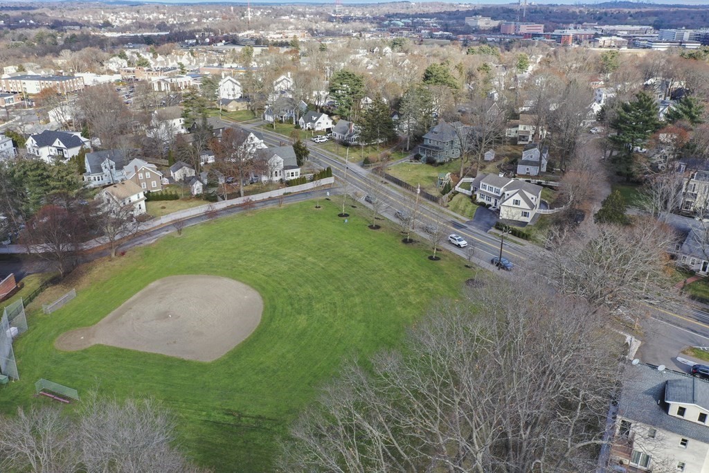 348 Webster Street Needham, MA 02494 - Photo 41 of 42 an aerial view of residential houses with outdoor space and trees