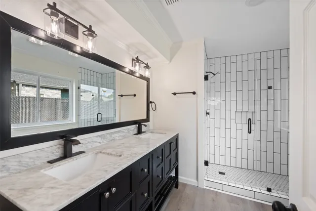 a view of a kitchen with large windows