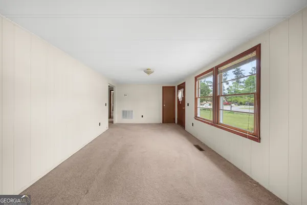 an empty room with windows
