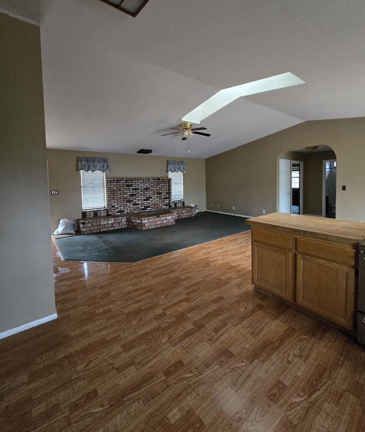 4940 Old Lewiston Road Lewiston, CA 96052 - Photo 14 of 27 a living room with kitchen furniture and a wooden floor