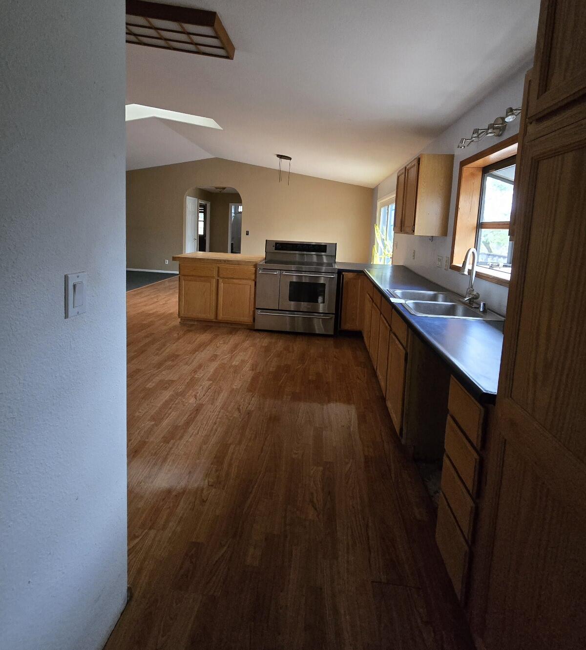 4940 Old Lewiston Road Lewiston, CA 96052 - Photo 15 of 27 a kitchen with sink cabinets and counter top space