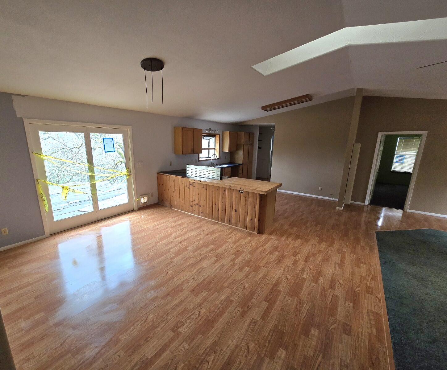 4940 Old Lewiston Road Lewiston, CA 96052 - Photo 17 of 27 a large living room with a wooden floor