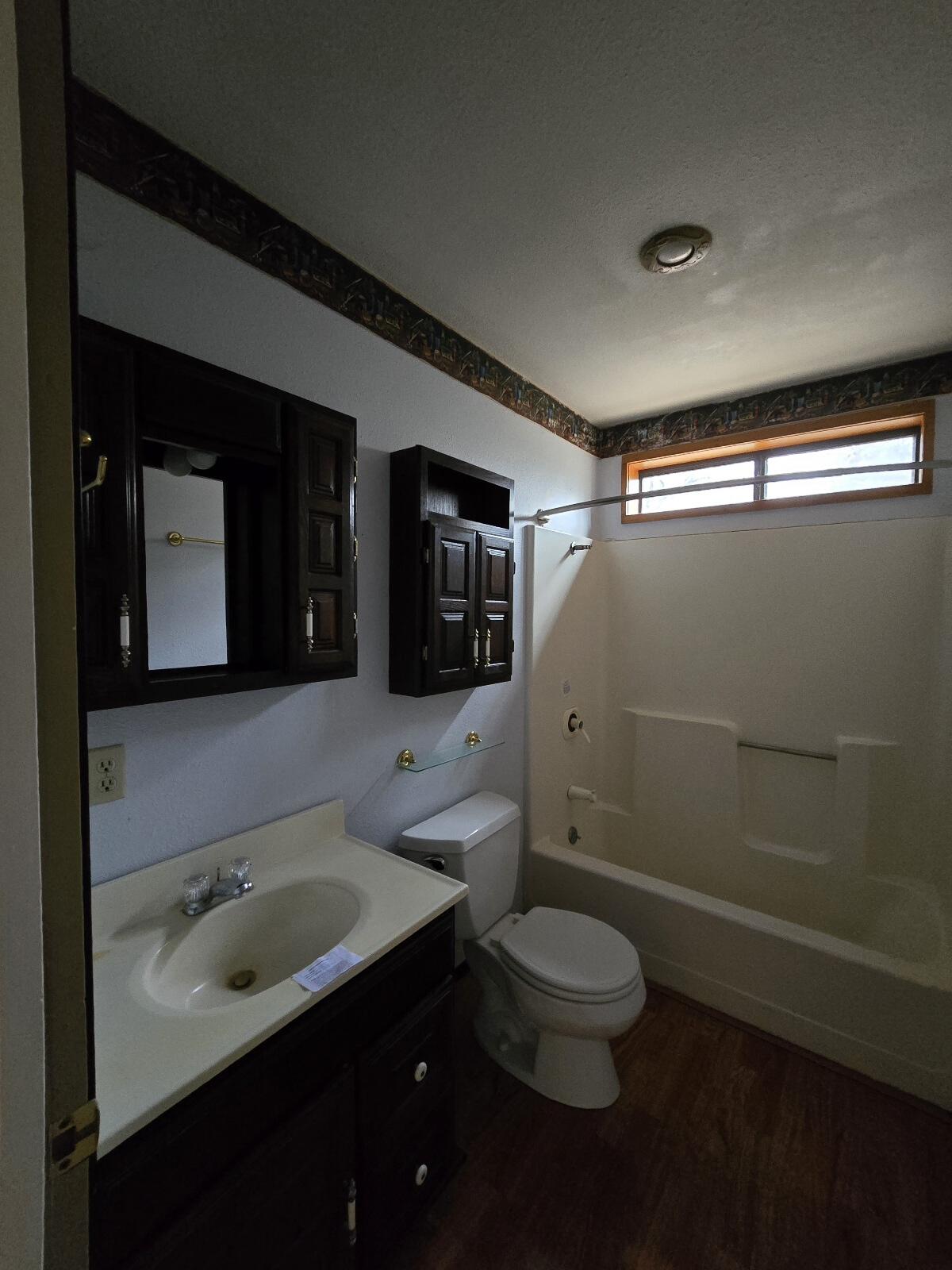 4940 Old Lewiston Road Lewiston, CA 96052 - Photo 23 of 27 a bathroom with a toilet sink a mirror and shower