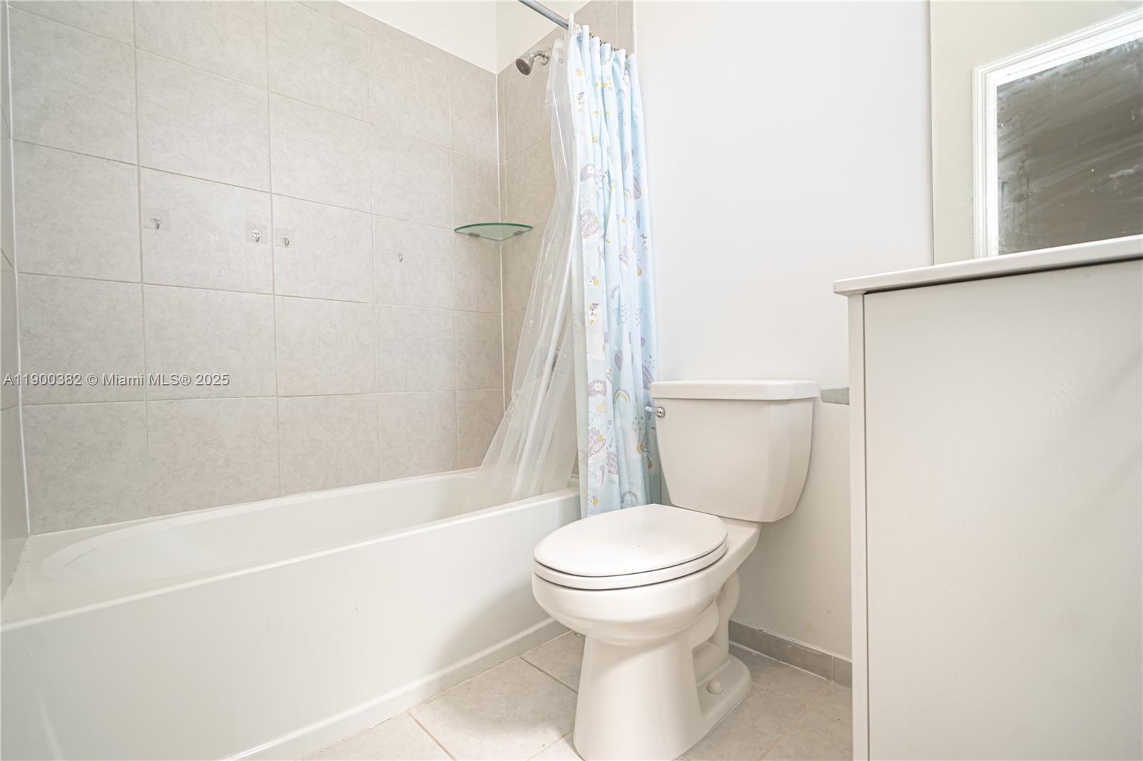 13237 Southwest 286th Street, Unit 13237 Homestead, FL 33033 - Photo 22 of 48 a bathroom with a toilet and a shower