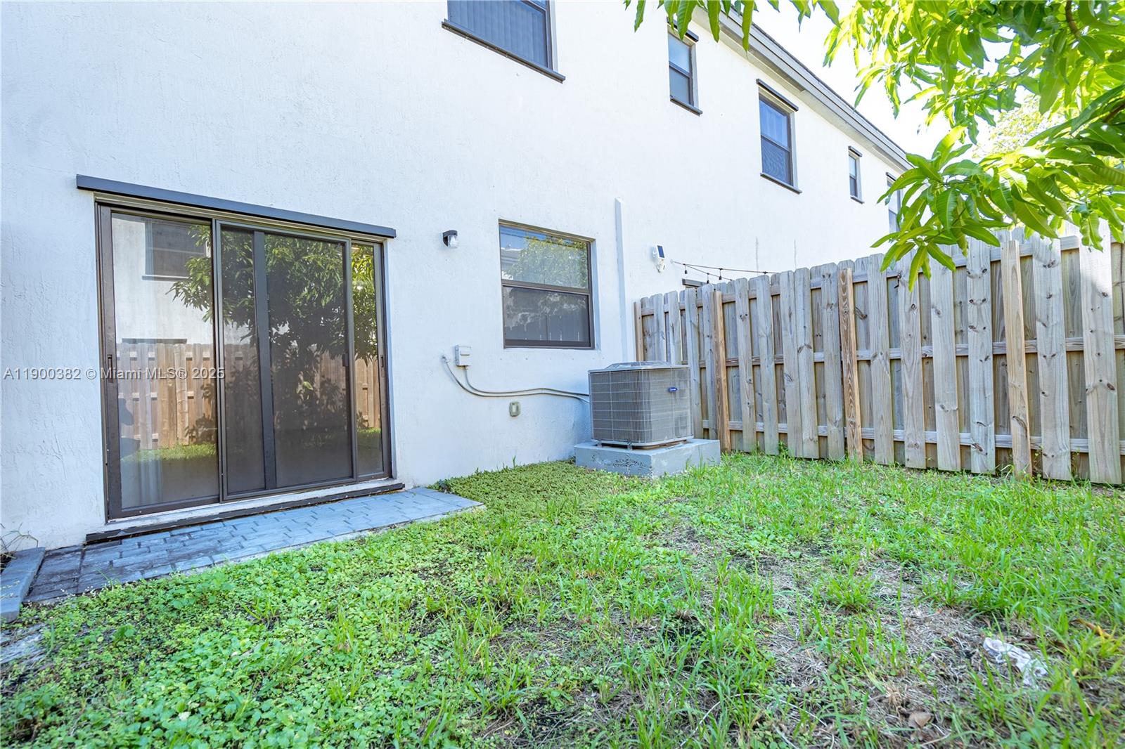 13237 Southwest 286th Street, Unit 13237 Homestead, FL 33033 - Photo 31 of 48 a view of backyard with garden