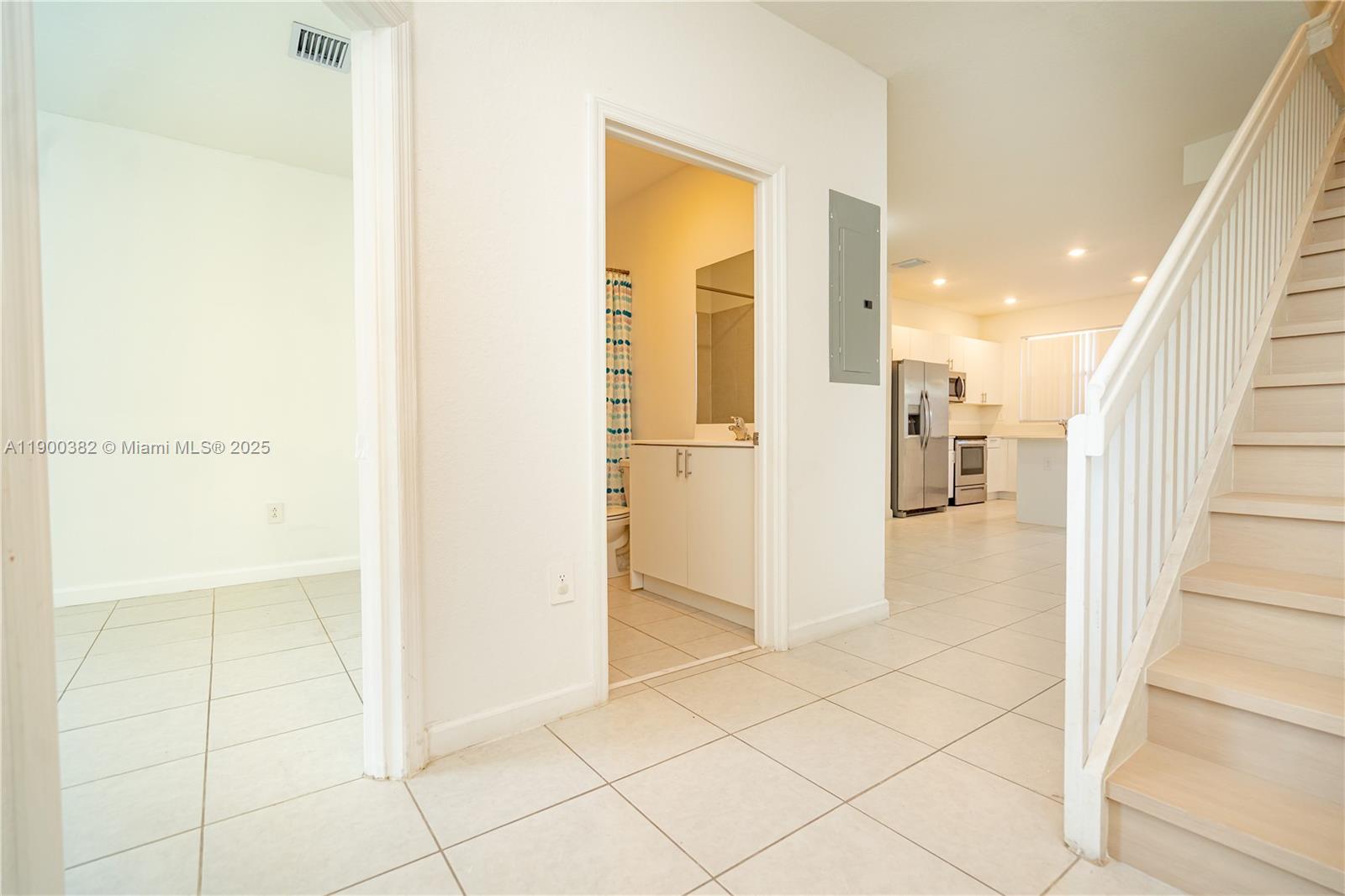 13237 Southwest 286th Street, Unit 13237 Homestead, FL 33033 - Photo 8 of 48 a view of a hallway with rooms