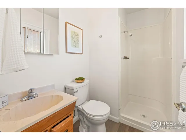 a kitchen with a stove and a refrigerator