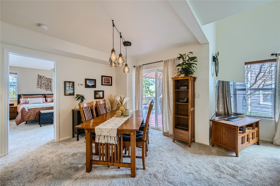 852 Alpine Road Dillon, CO 80435 - Photo 5 of 29 a view of a dining room with furniture and a chandelier