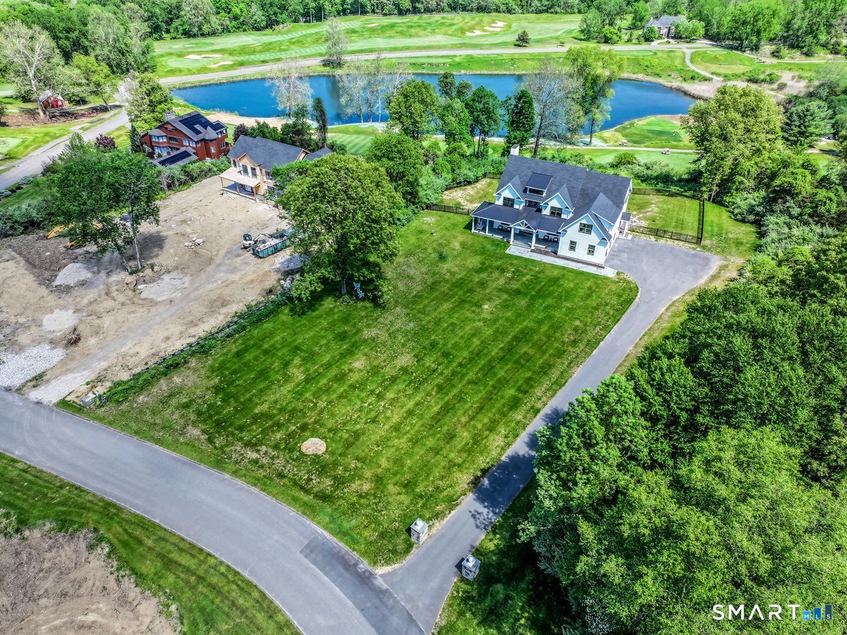 2 Pond View Lane Sherman, CT 06784 - Photo 36 of 40 a view of a backyard with a garden