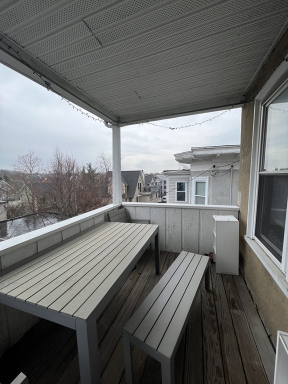 121 Liberty Road, Unit 3 Somerville, MA 02144 - Photo 20 of 24 a view of a balcony with furniture
