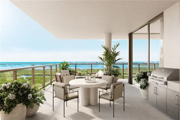 a dining room with furniture and floor to ceiling windows