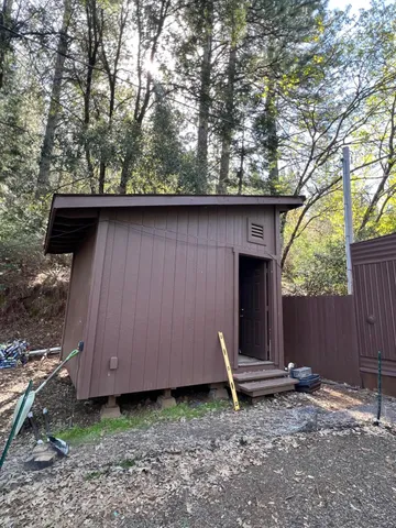 a backyard of a house with lots of green space