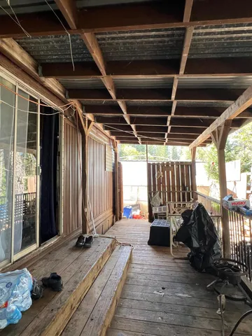 a view of porch with seating space