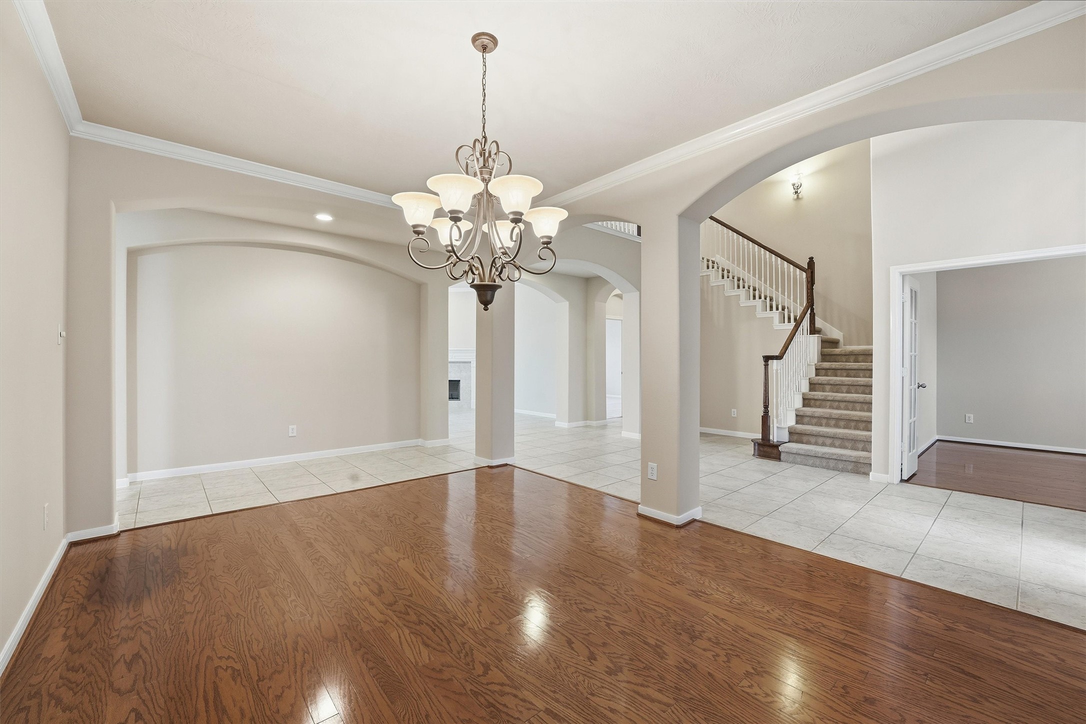 17415 Memorial Mills Drive Spring, TX 77379 - Photo 13 of 39 The formal dining room offers hardwood flooring, crown molding, and an elegant chandelier, conveniently located near the foyer and kitchen.