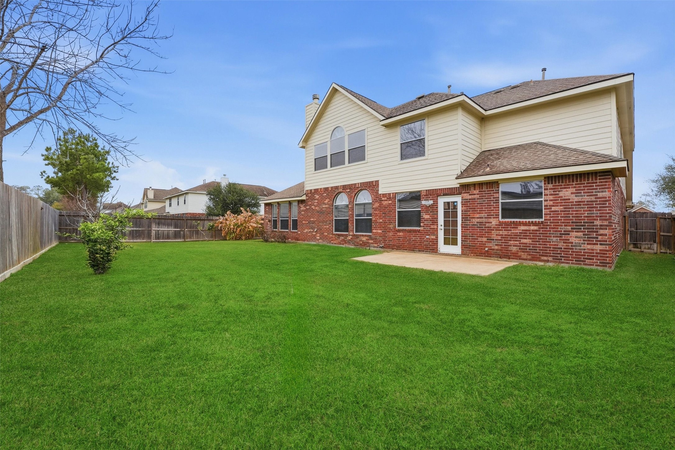 17415 Memorial Mills Drive Spring, TX 77379 - Photo 36 of 39 a front view of a house with a yard and green space