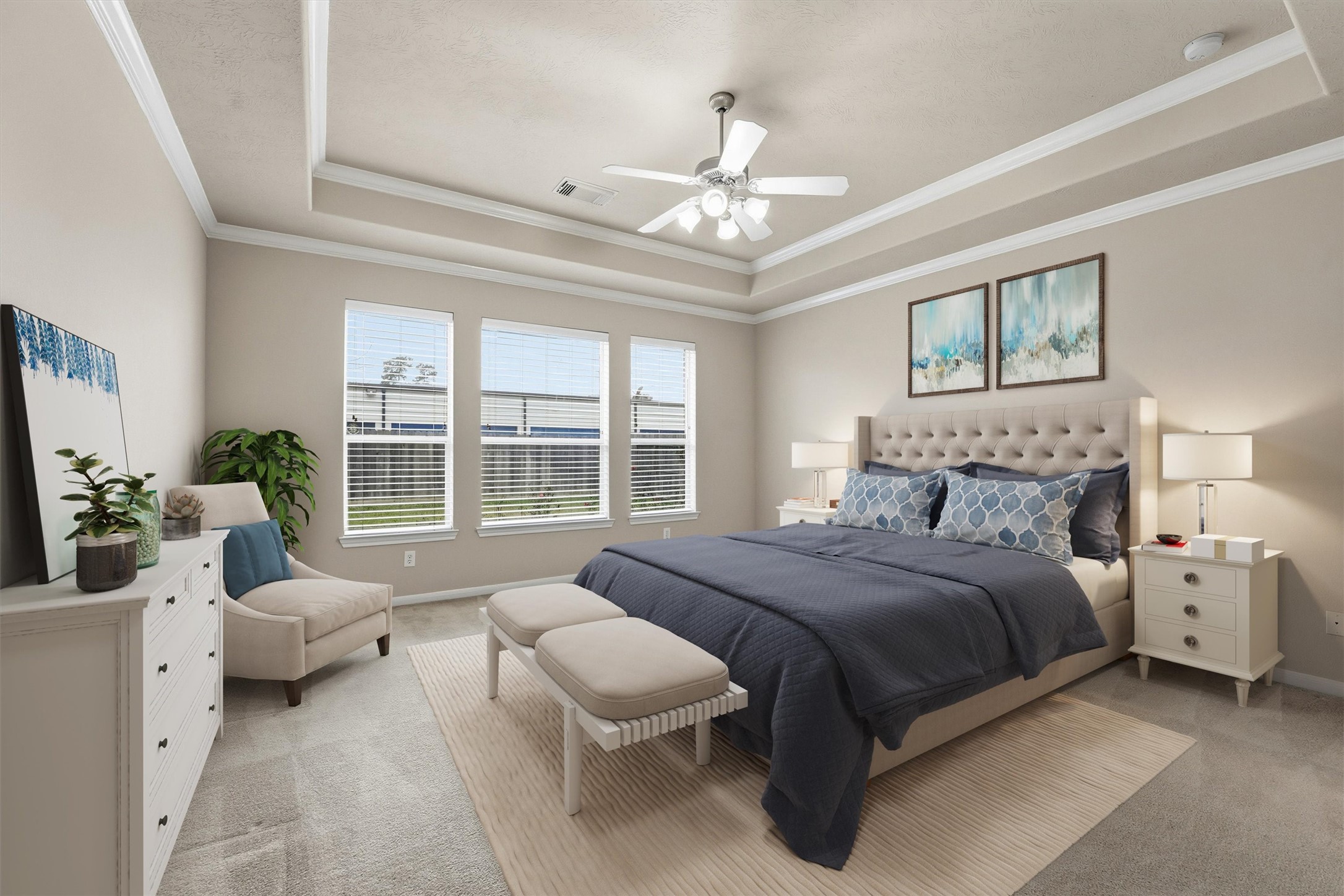 17415 Memorial Mills Drive Spring, TX 77379 - Photo 6 of 39 The primary bedroom features a tray ceiling with crown molding, plush carpet, and multiple windows providing abundant natural light. (This room has been virtually staged.)