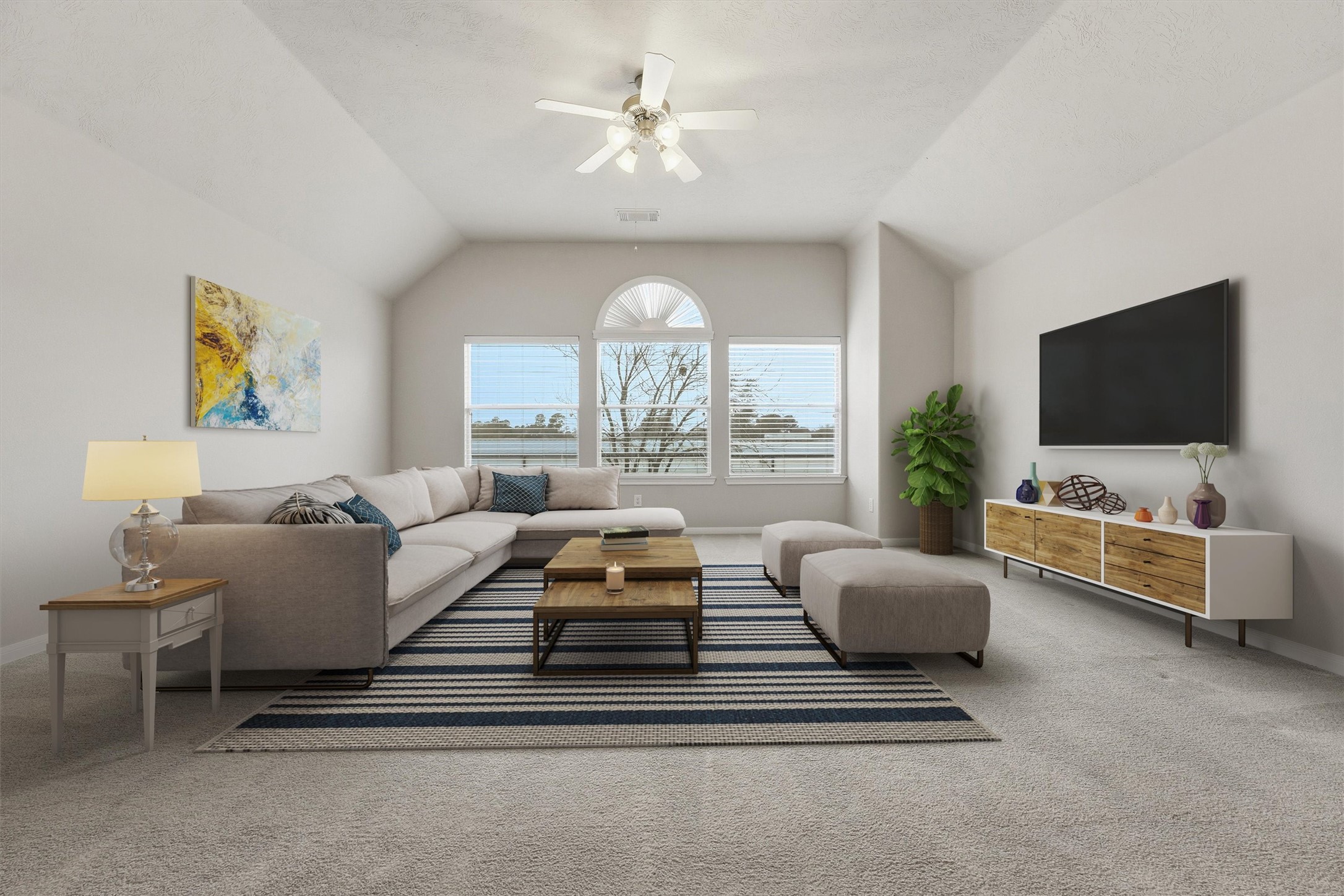 17415 Memorial Mills Drive Spring, TX 77379 - Photo 8 of 39 The upstairs game/media room offers a versatile flex space with vaulted ceilings, plush carpet, and abundant natural light. Located just beyond the second-floor overlook. (This room has been virtually staged.)