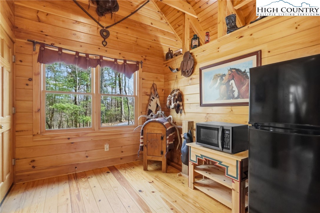 130 Hawkbill Road Ferguson, NC 28624 - Photo 31 of 50 a view of a room with wooden floor and windows