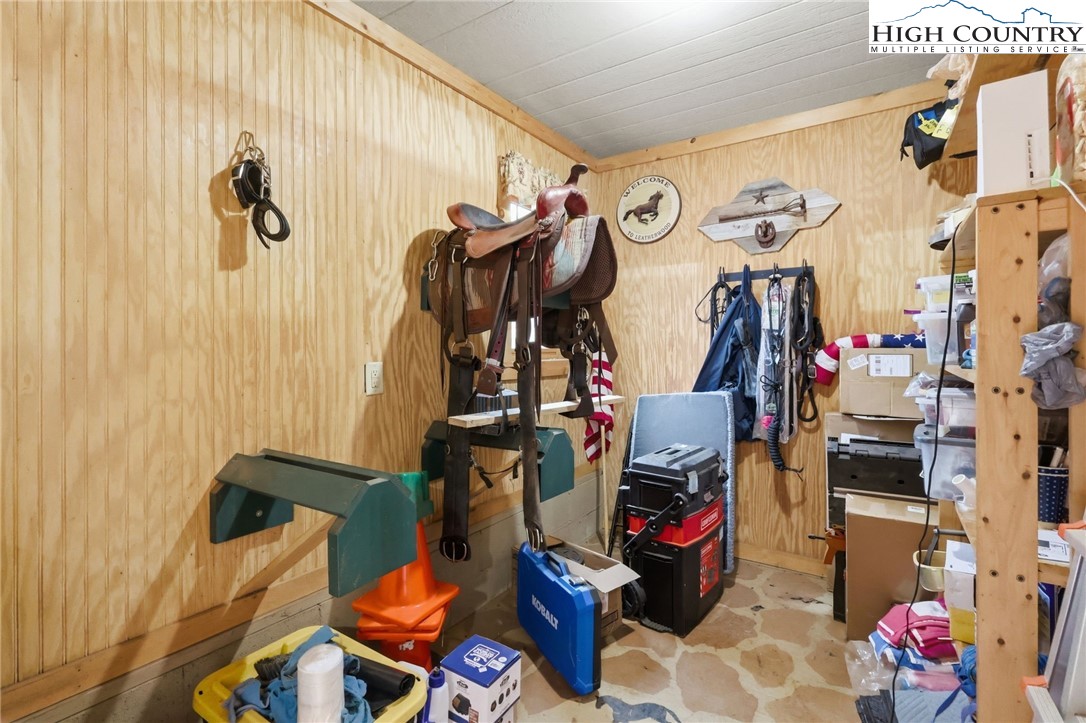 130 Hawkbill Road Ferguson, NC 28624 - Photo 36 of 50 a view of walk in closet with clothes