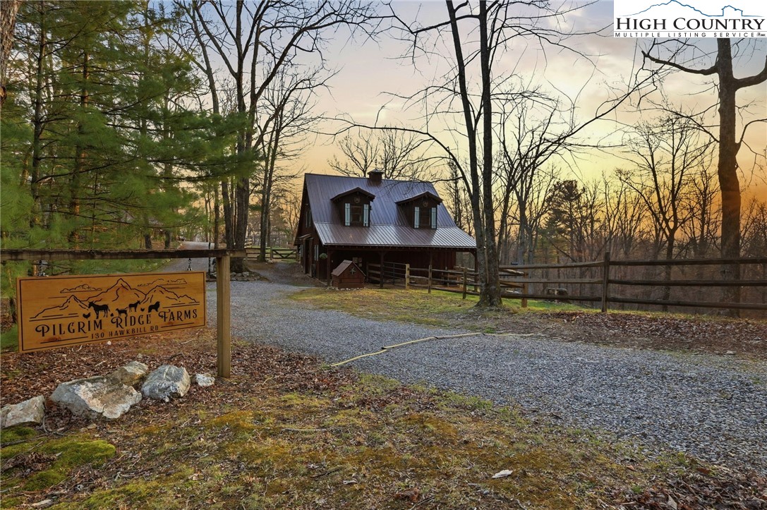 130 Hawkbill Road Ferguson, NC 28624 - Photo 6 of 50 a view of a yard with wooden fence