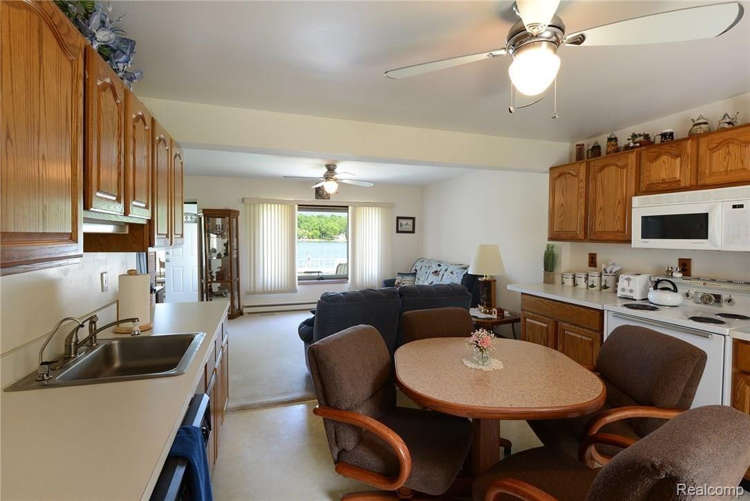 2937 Rubbins Road Howell, MI 48843 - Photo 6 of 27 Great views of the lake whether cooking, eating or relaxing in the living room.jpg