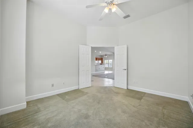 a bathroom with double sink and a mirror