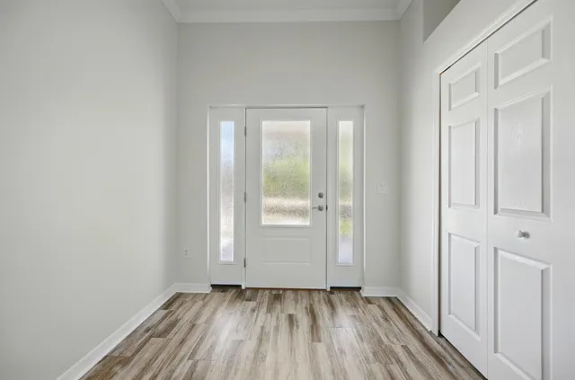 a view of an empty room with a window
