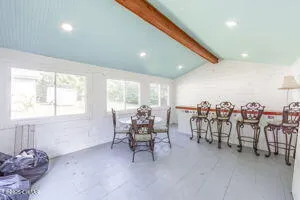 a very nice looking hall with many windows