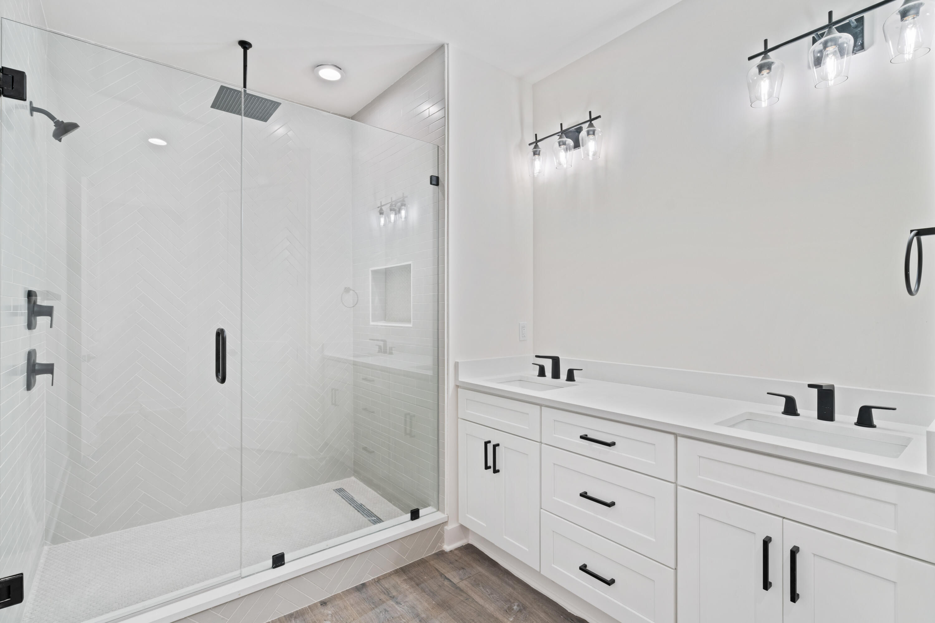 949 Bay Grove Road Freeport, FL 32439 - Photo 14 of 44 a bathroom with a shower sink and mirror