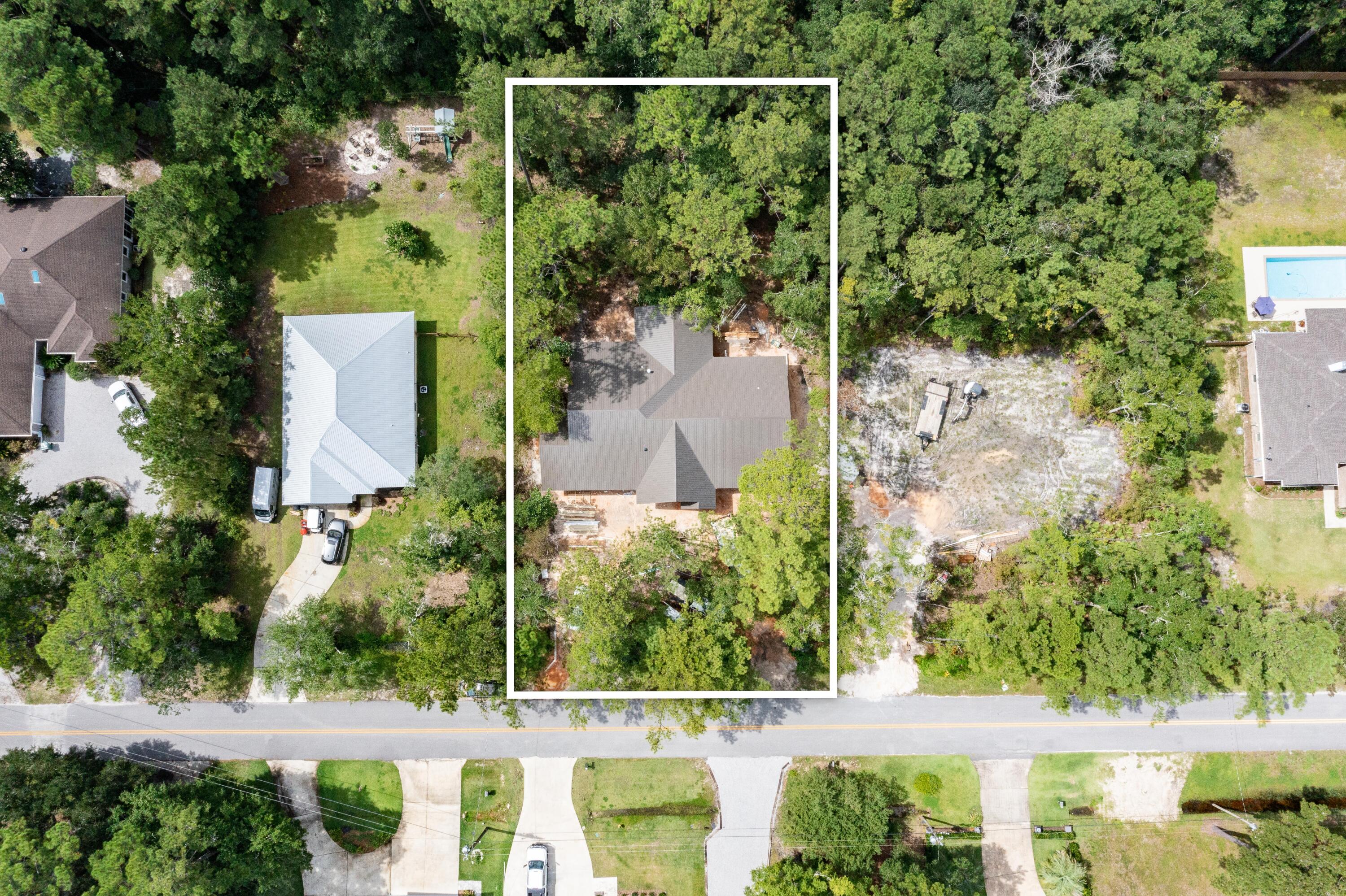949 Bay Grove Road Freeport, FL 32439 - Photo 3 of 44 a view of an outdoor space