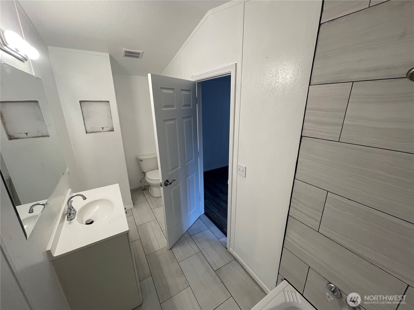 5705 Littlerock Road Southwest, Unit 16 Tumwater, WA 98512 - Photo 15 of 18 a bathroom with a sink and toilet