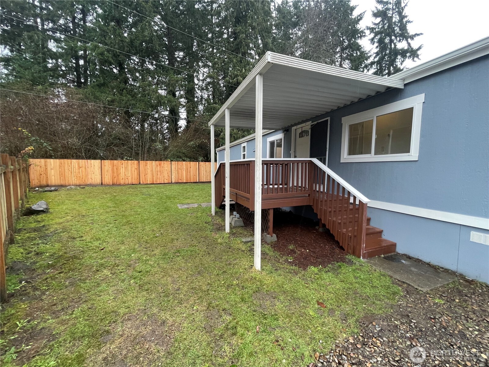 5705 Littlerock Road Southwest, Unit 16 Tumwater, WA 98512 - Photo 3 of 18 a view of house with a yard