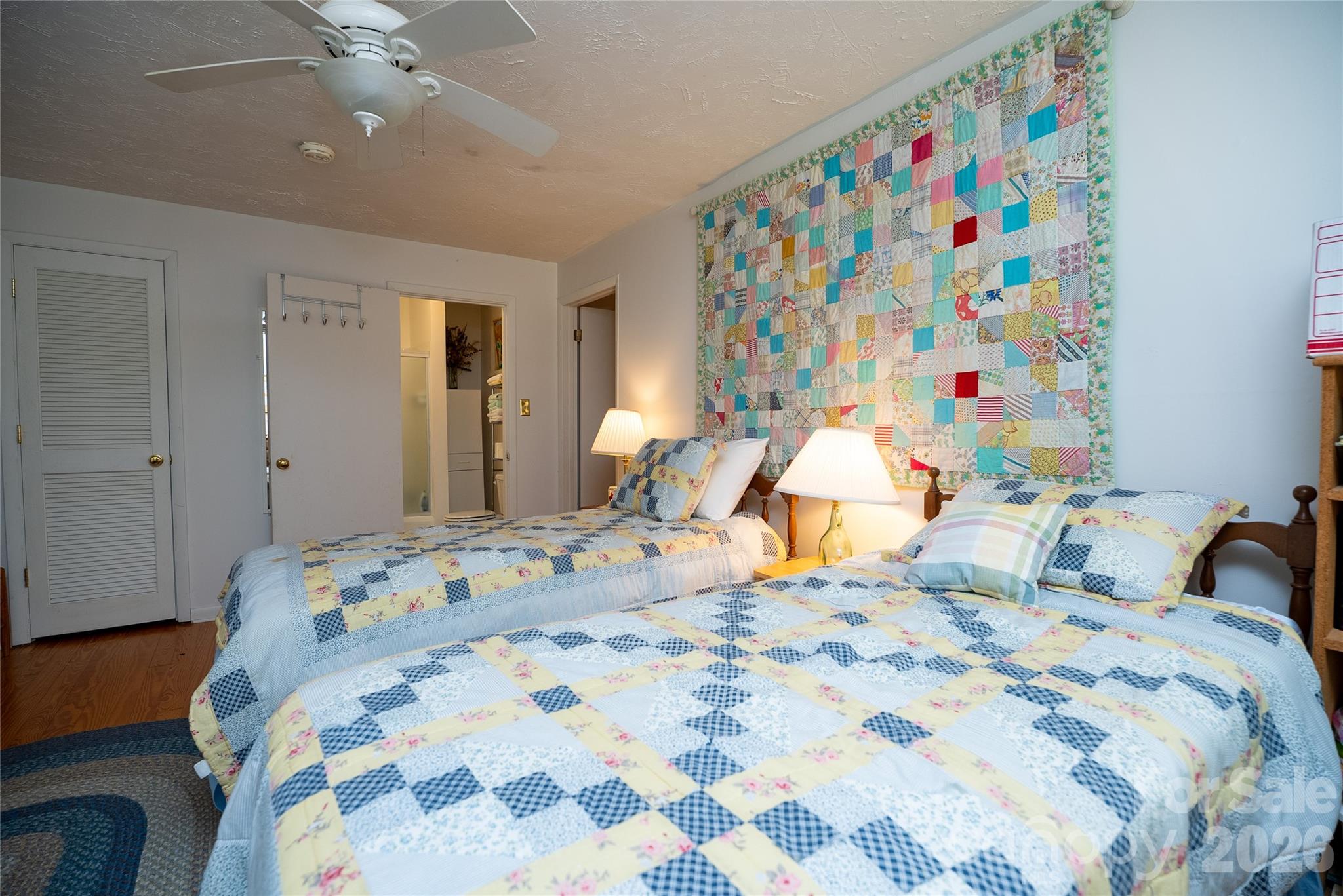 1412 North Bearwallow Road Fletcher, NC 28732 - Photo 23 of 30 a bedroom with a bed and window