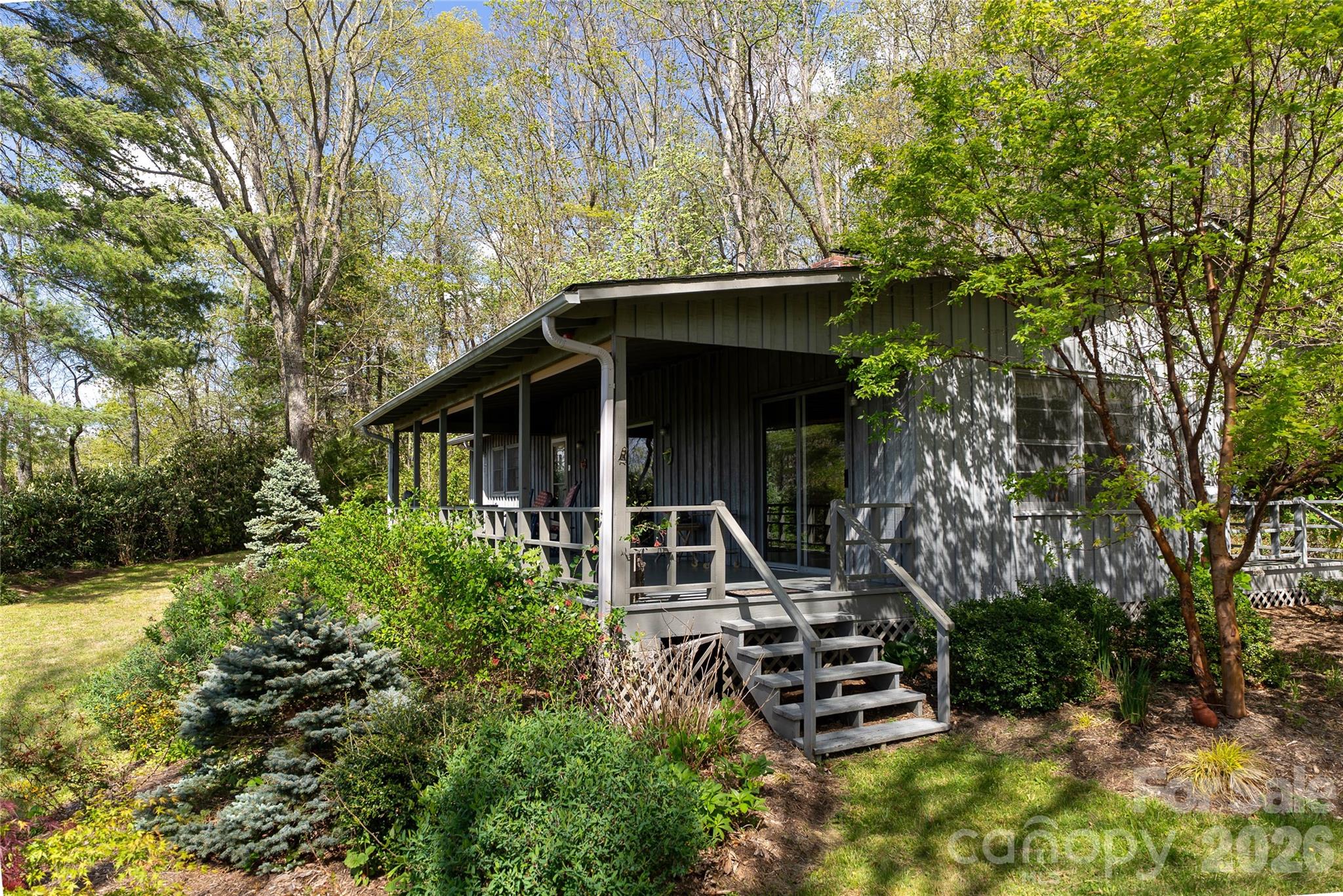 1412 North Bearwallow Road Fletcher, NC 28732 - Photo 6 of 30 a front view of a house with a yard
