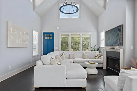 a view of a dining room with furniture and window