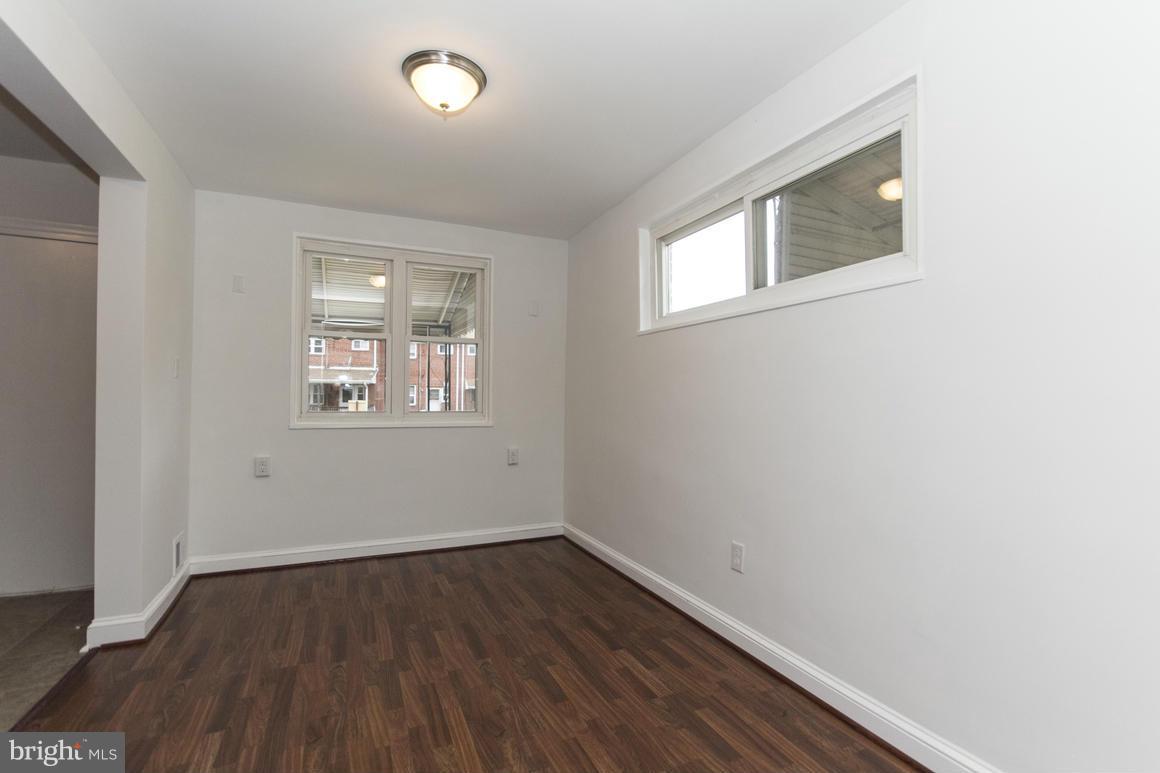 1902 Jasmine Road Baltimore, MD 21222 - Photo 9 of 27 an empty room with a window