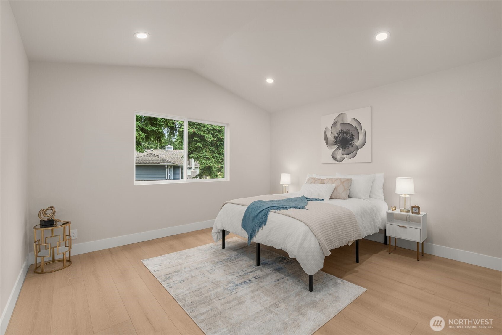 301 236th Place Southwest Bothell, WA 98021 - Photo 14 of 35 a spacious bedroom with a bed and a window