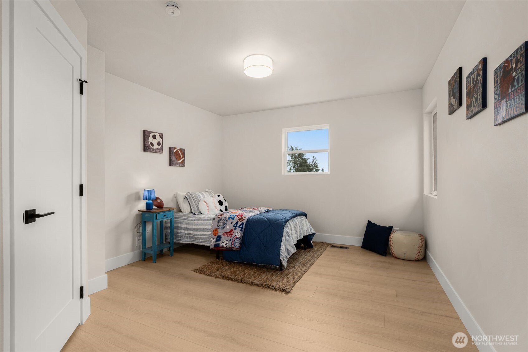 301 236th Place Southwest Bothell, WA 98021 - Photo 20 of 35 a bedroom with furniture and a window