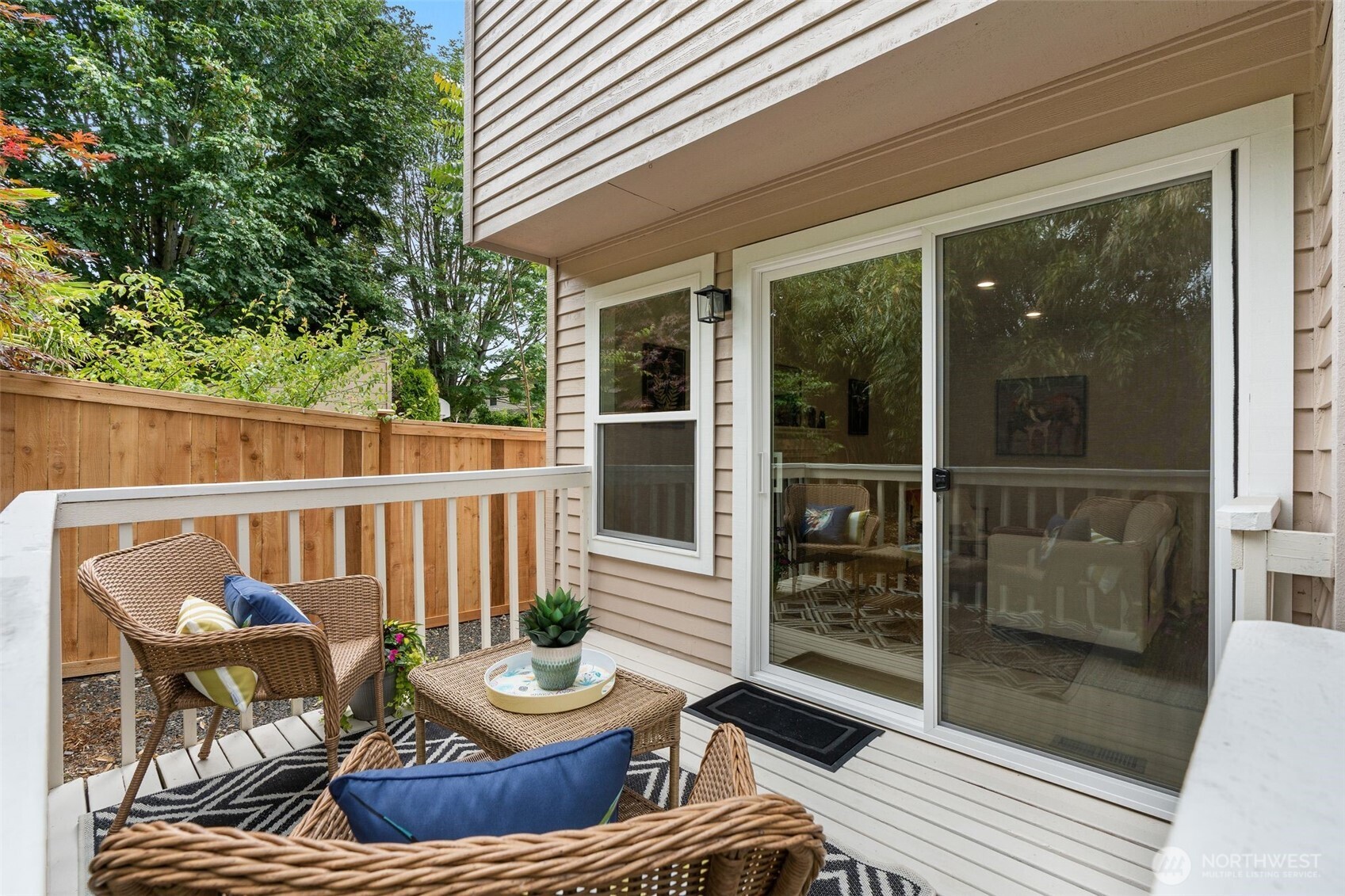 301 236th Place Southwest Bothell, WA 98021 - Photo 24 of 35 a balcony with table and chairs