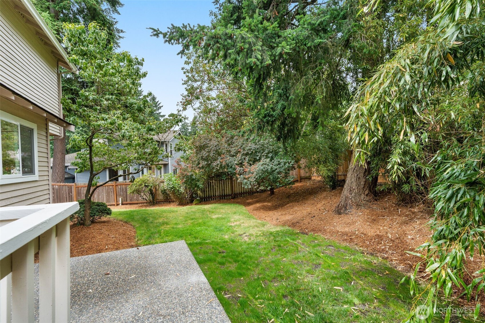 301 236th Place Southwest Bothell, WA 98021 - Photo 25 of 35 a view of a backyard with a garden