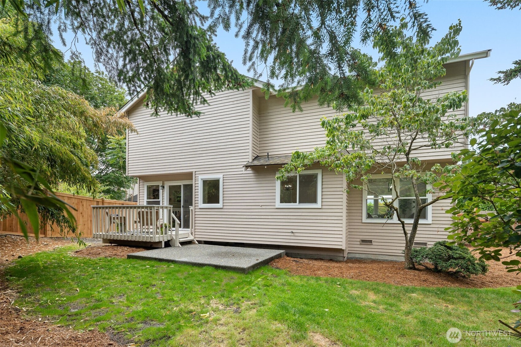 301 236th Place Southwest Bothell, WA 98021 - Photo 26 of 35 a view of a house with a backyard