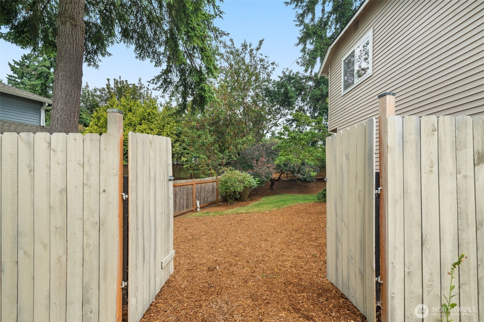 301 236th Place Southwest Bothell, WA 98021 - Photo 28 of 35 a view of a house with backyard