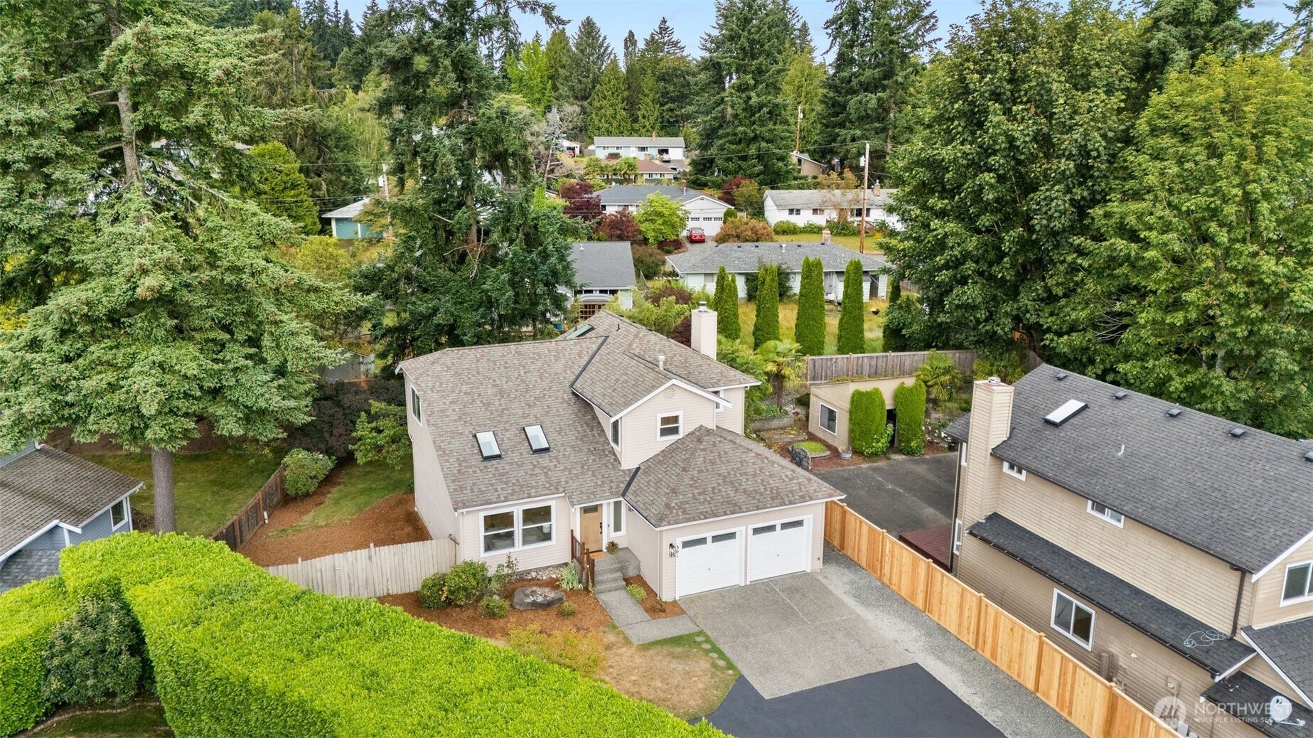 301 236th Place Southwest Bothell, WA 98021 - Photo 29 of 35 an aerial view of a house with a garden