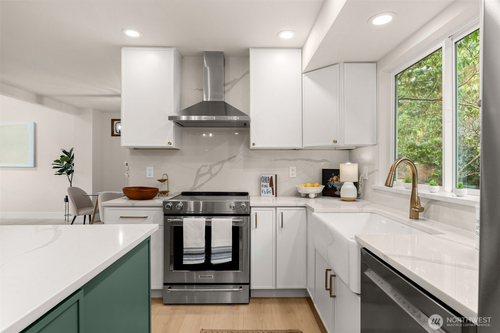 301 236th Place Southwest Bothell, WA 98021 - Photo 3 of 35 a kitchen with a sink a stove and cabinets