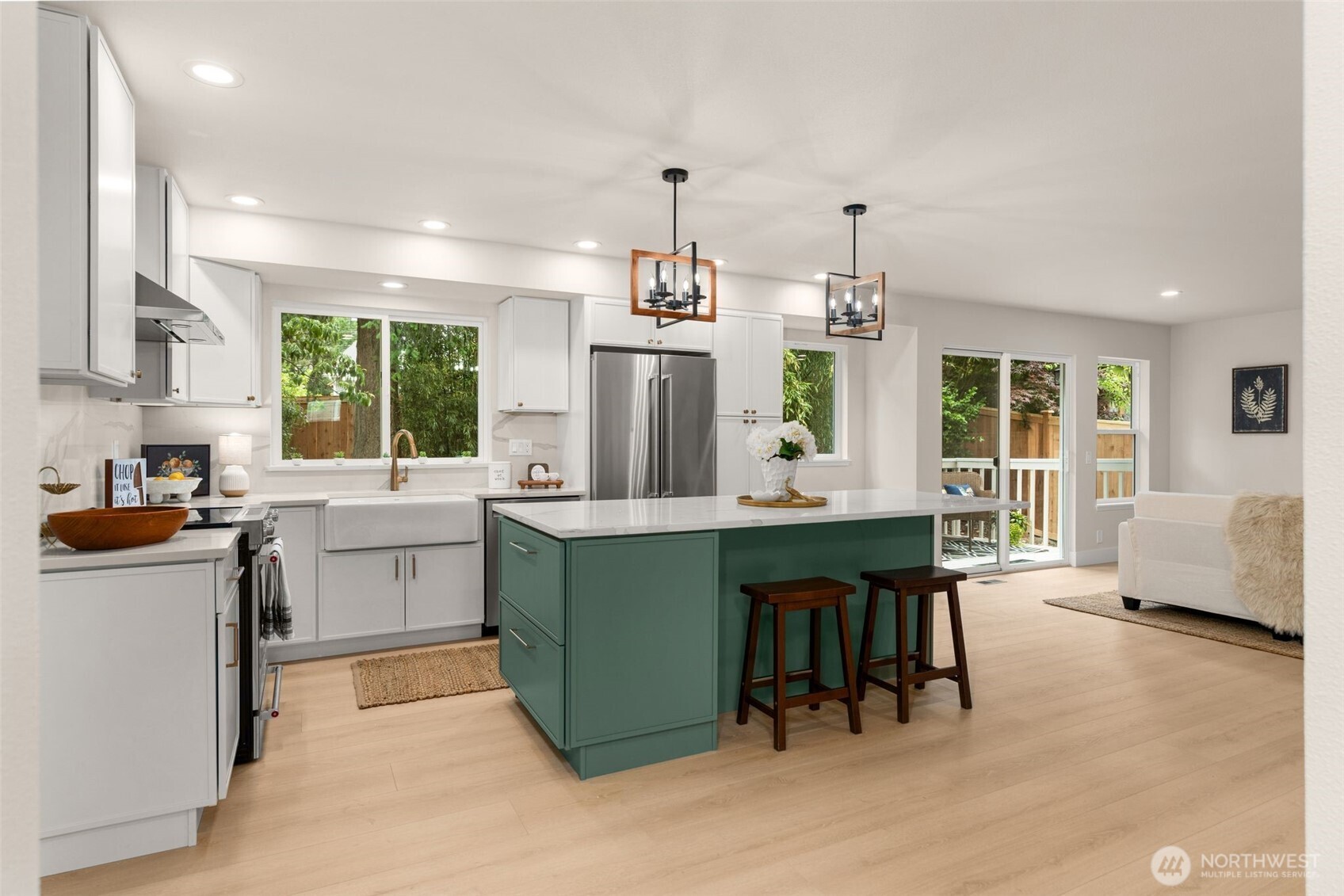 301 236th Place Southwest Bothell, WA 98021 - Photo 5 of 35 a kitchen with sink and cabinets
